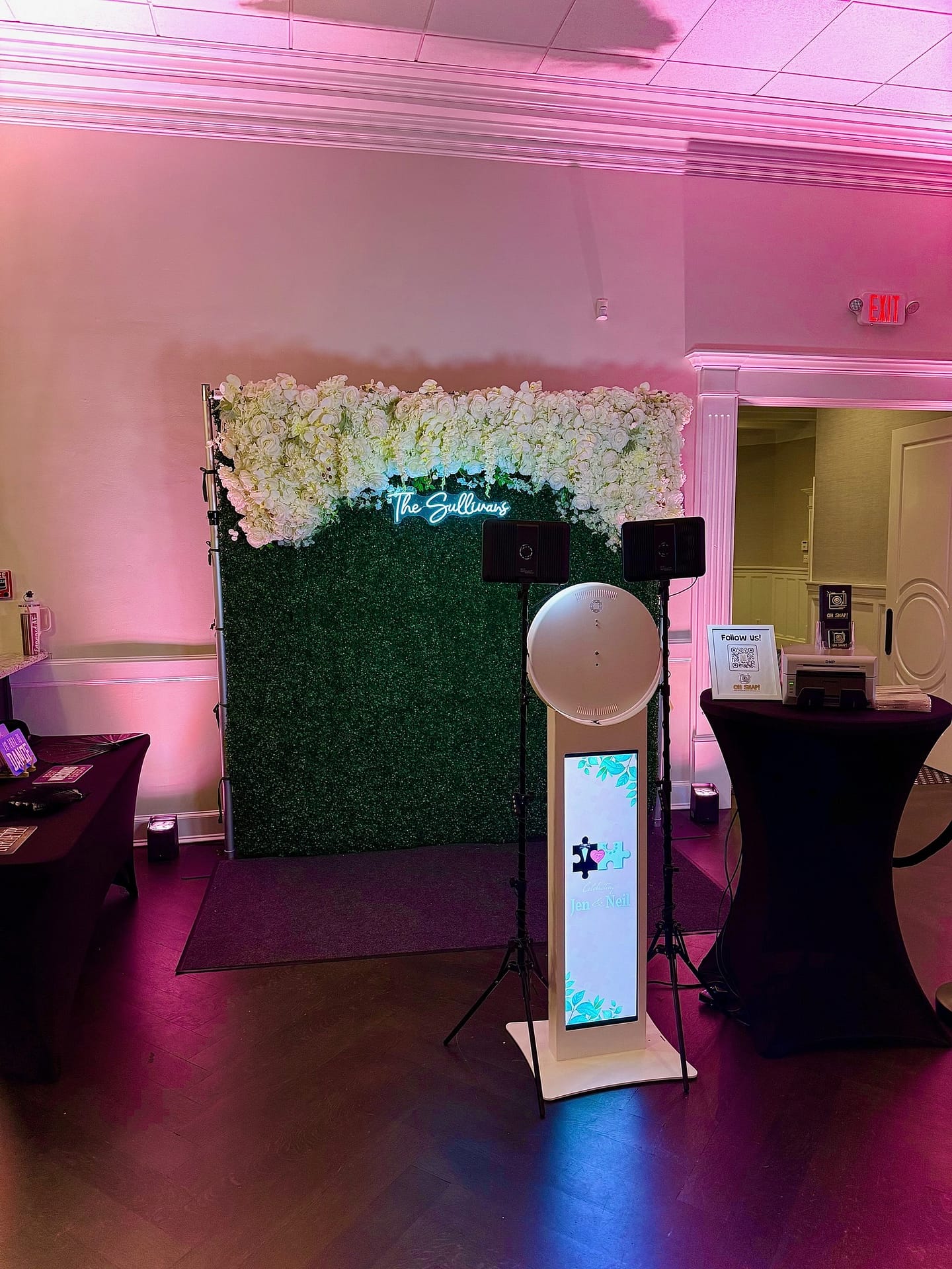 Guests posing at Oh Snap! luxury photo booth at a New England wedding